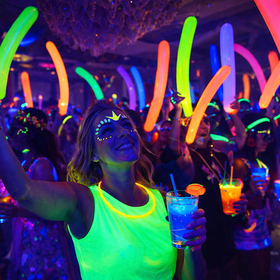 Full Moon Party -Our Signature Activity A high-end glow-in-the-dark dance floor experience that turns any event into something unforgettable. With UV lighting, giant glowing balloons, glow paint, glowing drinks & live characters as everyone dances & shines